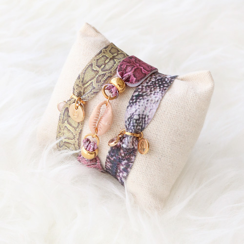 Handmade statement earrings + bracelets with snake print 
