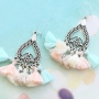 Statement earrings with tassels and matching bracelets and necklaces!