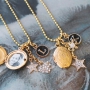 Create festive necklaces with pretty medallion, rhinestone and letter charms