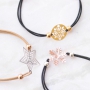 Bracelets and a keychain with bohemian pendants 
