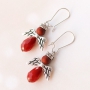Angels with top faceted drop shaped beads and metal wings