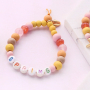 Beach jewellery with wooden beads, shells and DQ European metal