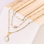Create minimalist jewellery with freshwater pearls and gold coloured earring findings
