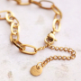 This is how you style the latest chain necklaces and chain bracelets: 