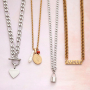 This is how you style the latest chain necklaces and chain bracelets: 