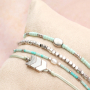 Get creative with mini beads and jump rings to make stylish jewellery