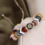 Create original jewellery with these tile beads in various shapes and colours