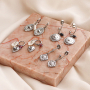 Create popular earrings with stainless steel charms