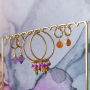 Design an earring collection with stainless steel creoles