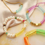 Inspiration for bracelets with acrylic beads, faceted beads and ribbon with text