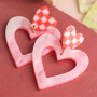 Create stylish earrings with resin pendants and stainless steel charms
