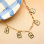 Create a unique collection with stainless steel shell charms with letters