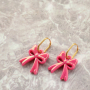 Jewellery inspiration with acrylic bow charms and heart earrings
