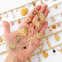 Create unique jewellery with hearts, country, and smiley charms