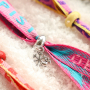 Create unique bracelets, keychains, and gifts with ribbon text 