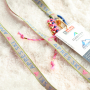 Create unique bracelets, keychains, and gifts with ribbon text 
