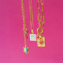 Create playful necklaces with stainless steel charms and letters