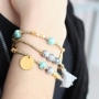 Pretty jewellery with marbled glassbeads,tassels, round sead beads and nice Designer Quality pearls and beads!