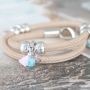 Faux eco nappa stitched leather and bright coloured beads put together as a trendy creation!