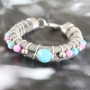 Faux eco nappa stitched leather and bright coloured beads put together as a trendy creation!
