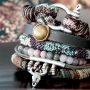 Nice arm candy made with stitched cord bohemian style
