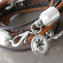 Work with layers like different kinds of round and braided DQ leather