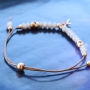 Jewellery set with an ethnic look made of DQ metal in rose gold & macram&eacute; string!