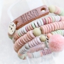 These bracelets in happy colours can be created with DQ Greek ceramic beads, how do you give your own twist to the design?