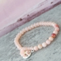 Beautiful semi-precious stone bracelets in soft colours mixed with wooden beads, cork, tassels and DQ metal charms.