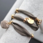 Create lovely bracelets with elastic Ibiza ribbon for your winter look!
