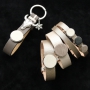 Jewellery and keychains with DQ leather cabochons.